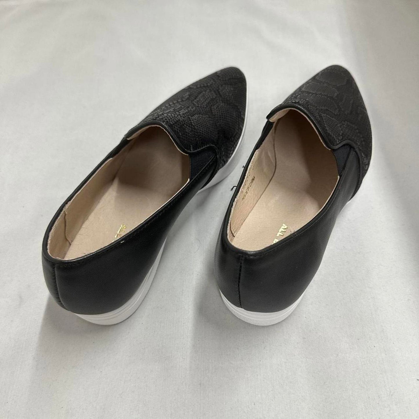 Sleek Black Textured Slip-On Shoes (37)