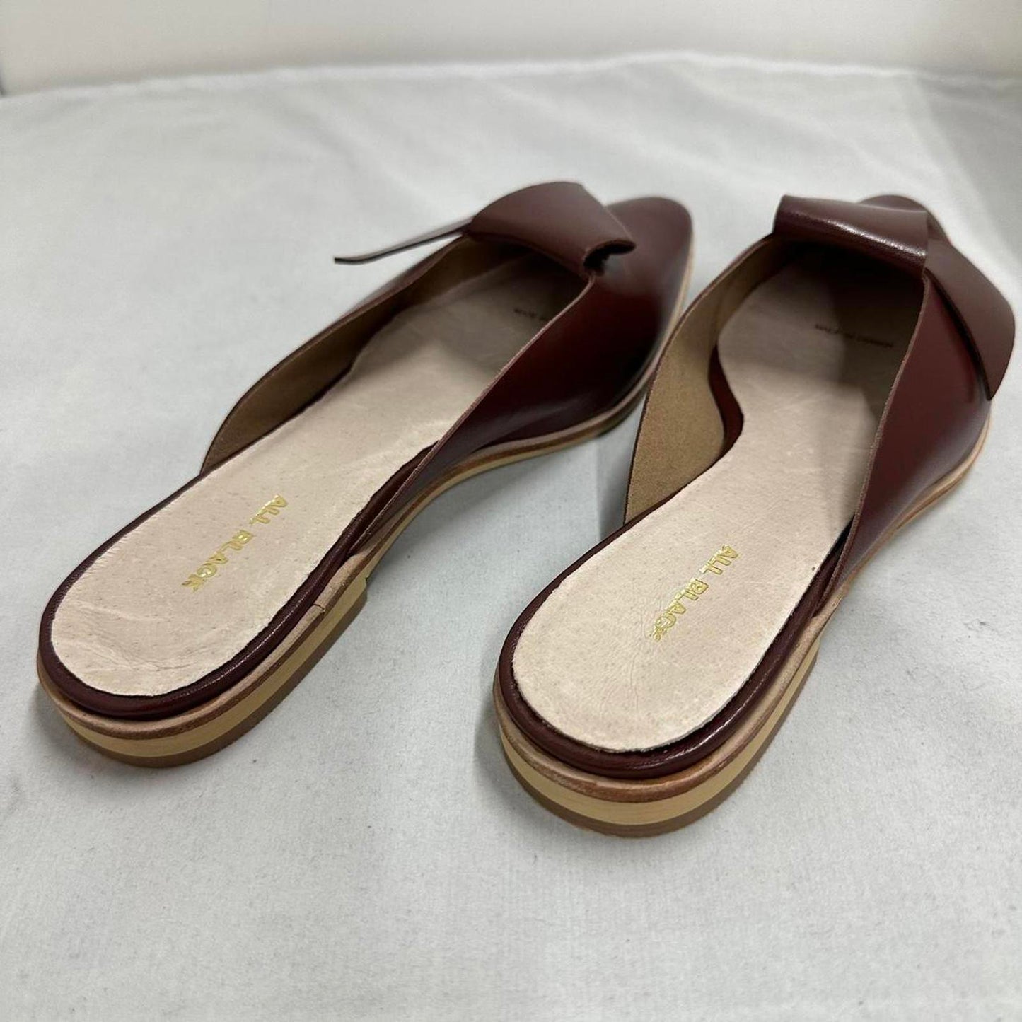 Contemporary Chic Wine Red Leather Half Bow Sandals (7.5)