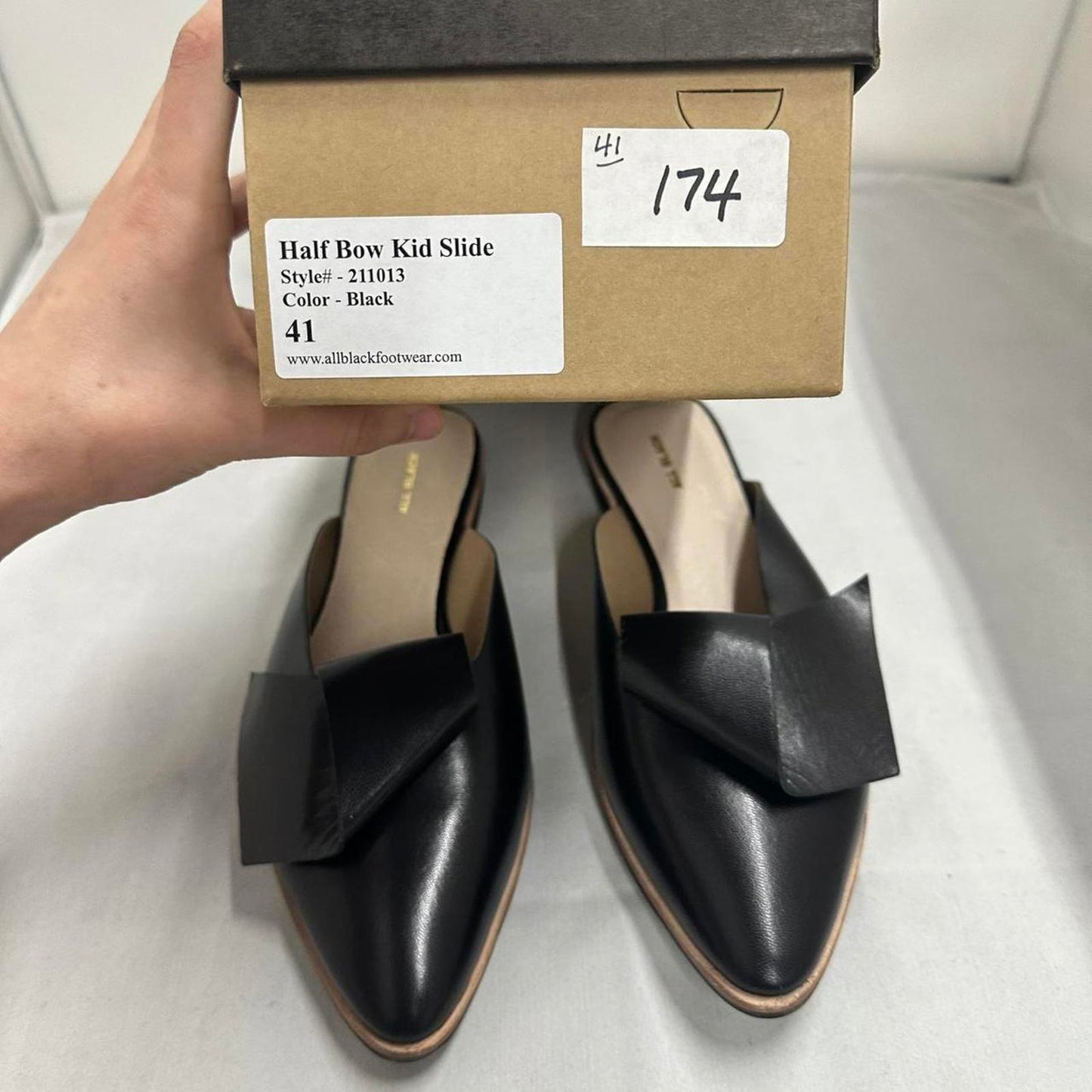 Contemporary Chic Black Leather Half Bow Mule Slides (10.5)