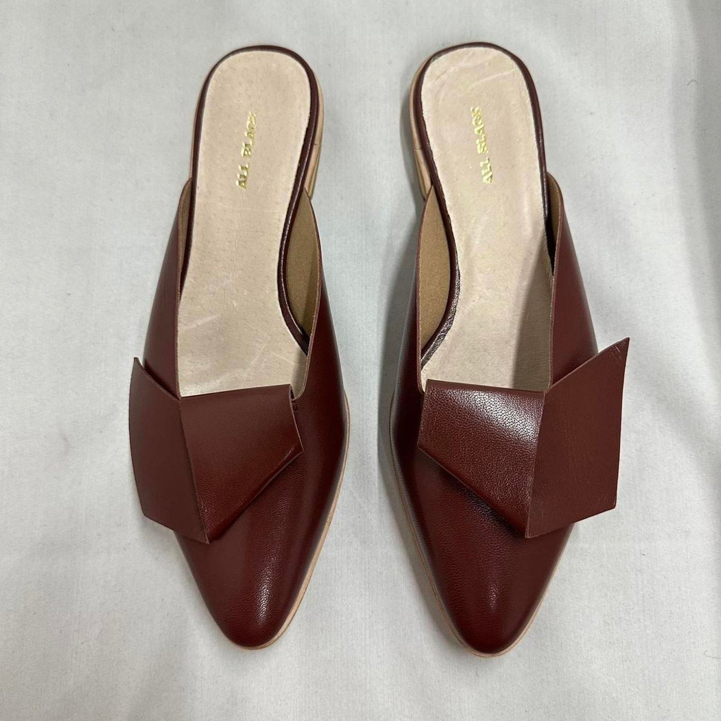 Contemporary Chic Wine Red Leather Half Bow Sandals (7.5)