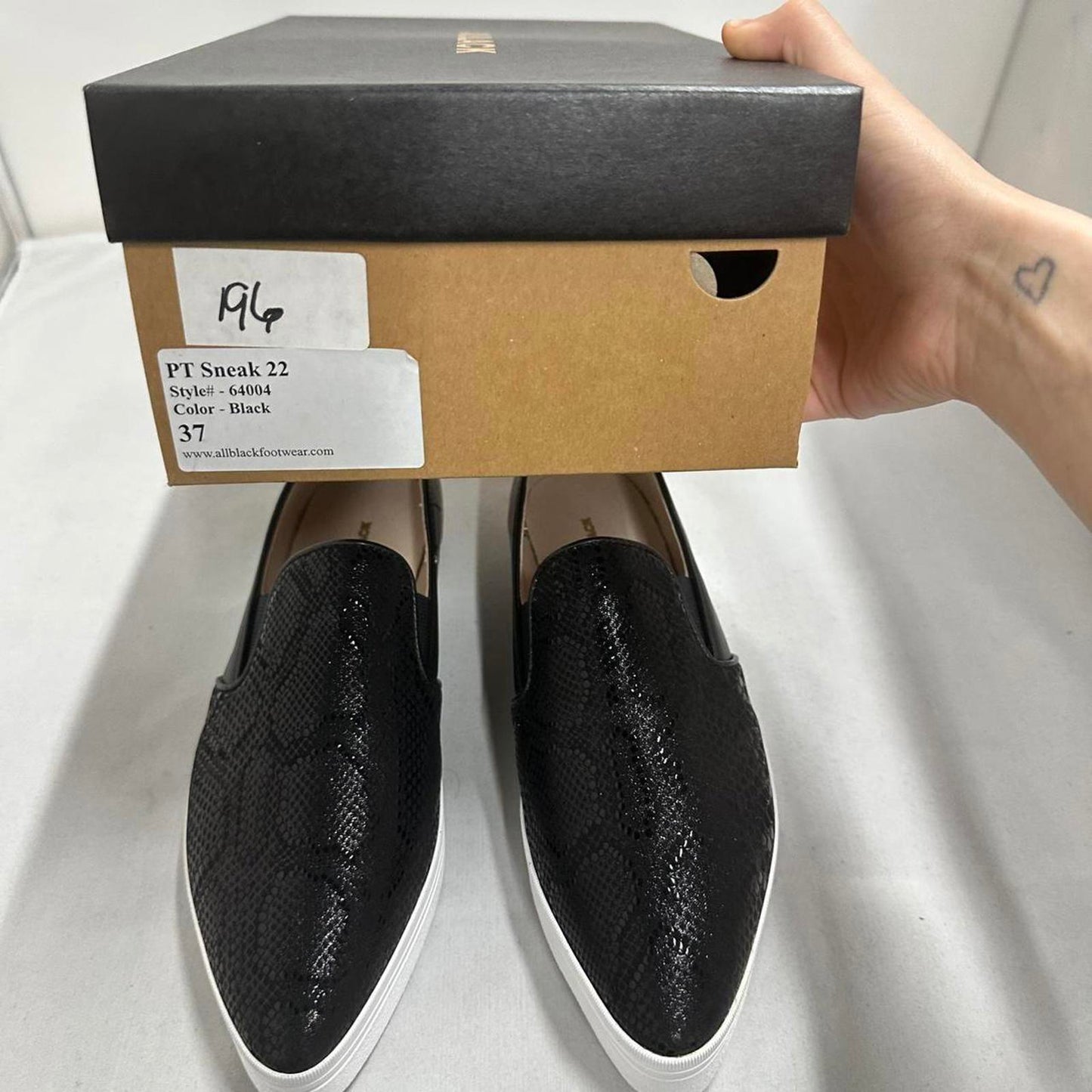 Sleek Black Textured Slip-On Shoes (37)