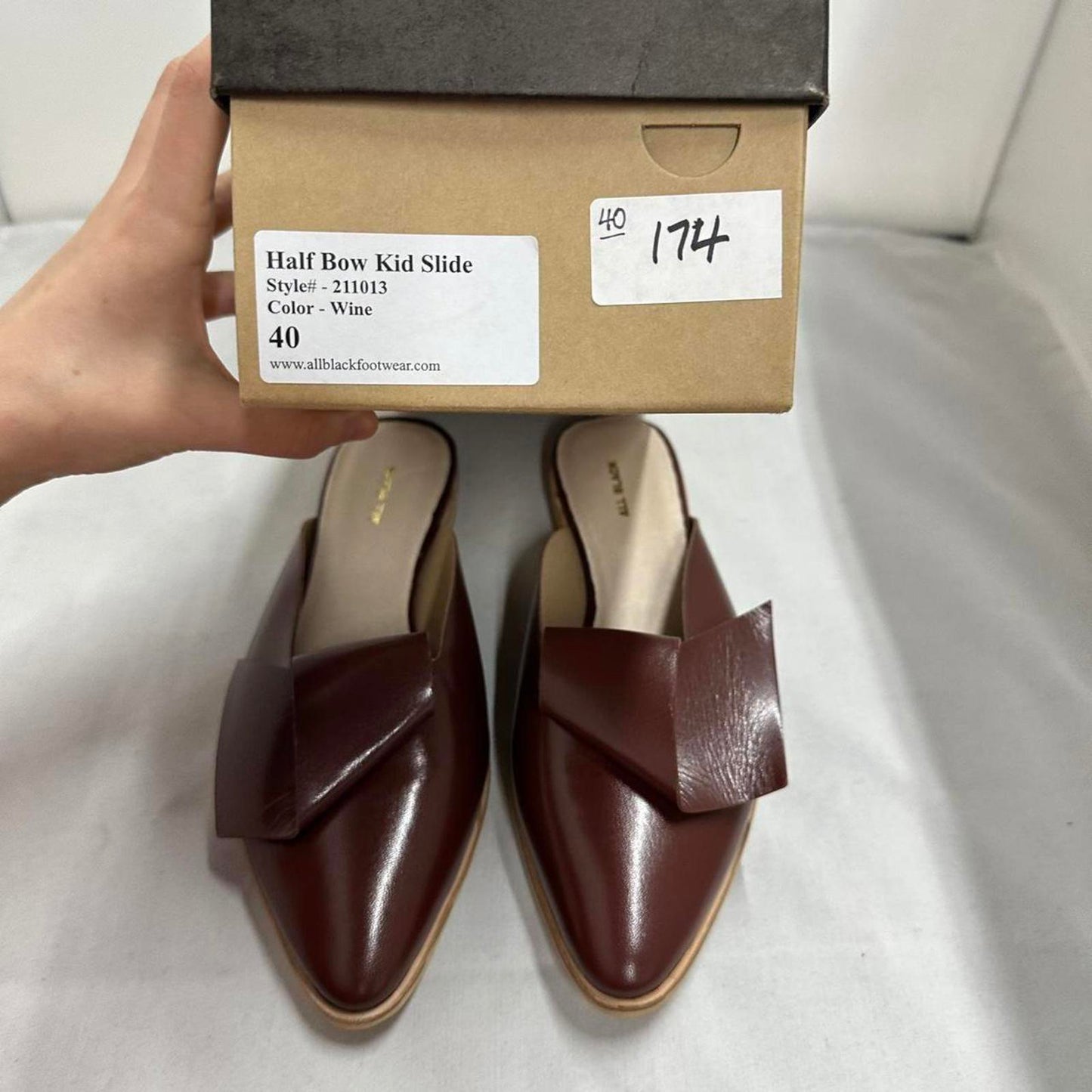 Contemporary Chic Wine Red Leather Half Bow Mule Sandals (9.5)