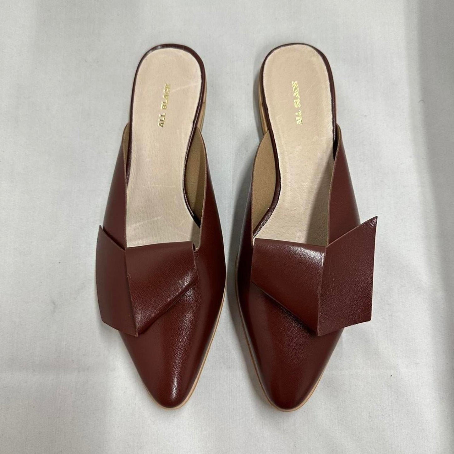 Contemporary Chic Wine Red Leather Half Bow Mule Sandals (9.5)