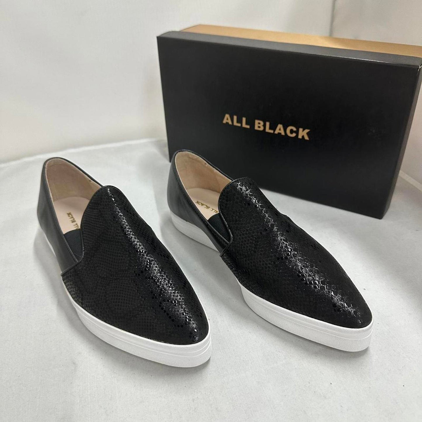 Sleek Black Textured Slip-On Sneakers (39)