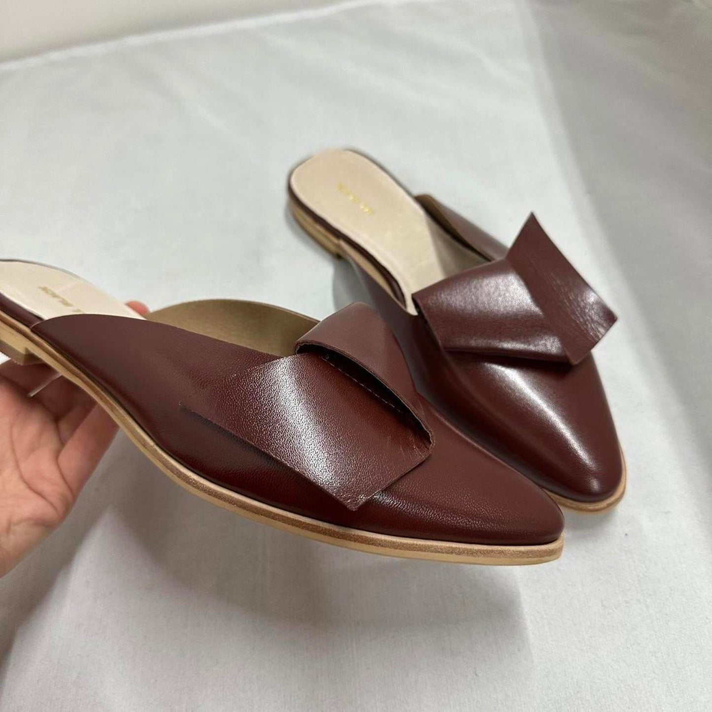 Contemporary Chic Wine Red Leather Half Bow Mule Sandals (9.5)