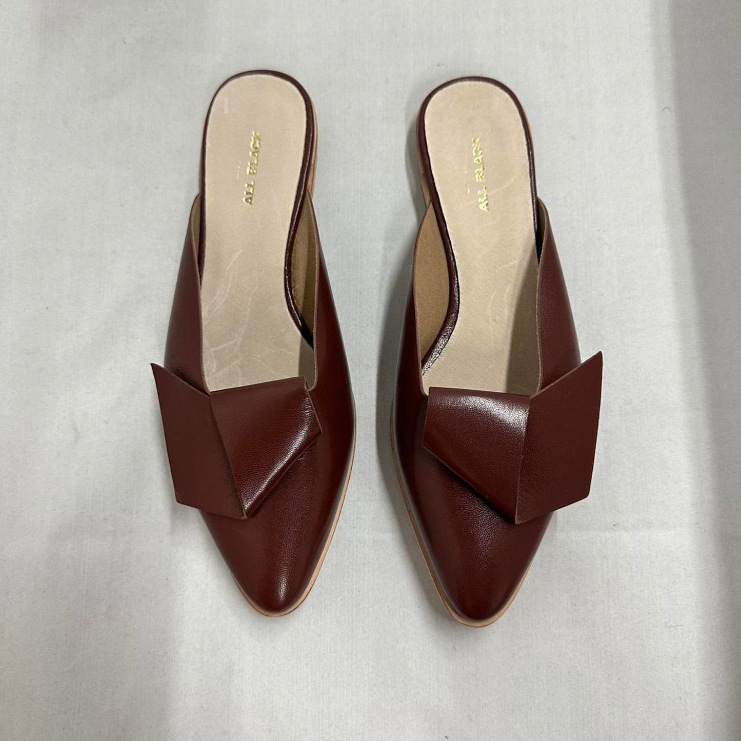 Contemporary Chic Wine Red Leather Half Bow Sandals (6.5)