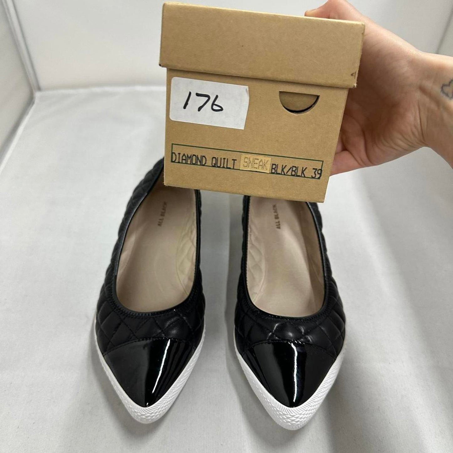 Sleek Black Quilted Sneakers (39)